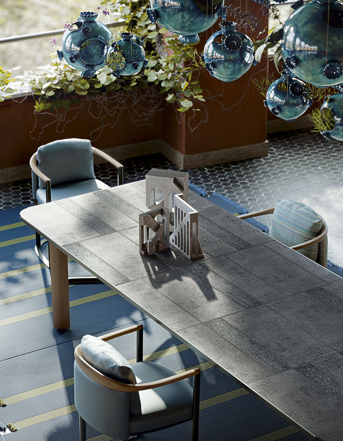 Image set at Villa Il Girasole®, Marcellise, Verona - Moorea table and chairs, Marimo sculptures, Nisida carpets.